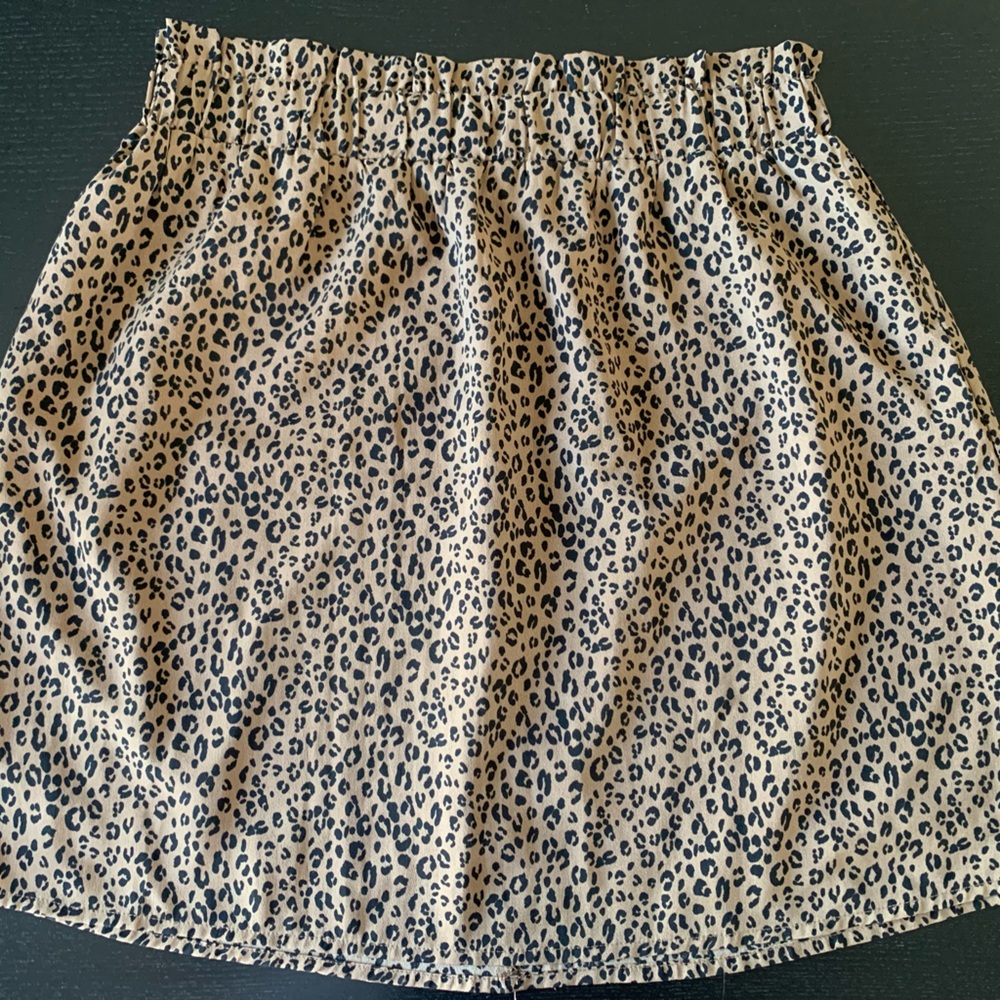 Hem and thread cheetah print skirt
